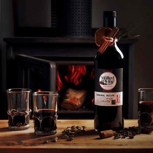mulledwine website v1 a bottle of wine on a table